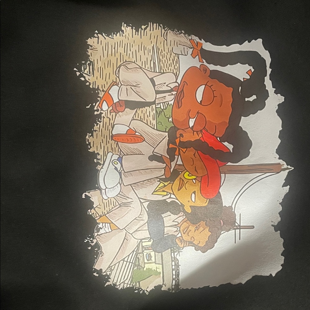 Black Graphic T-Shirt with Cartoon Design